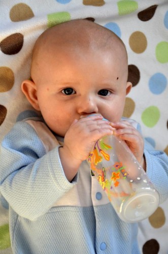 Holding a bottle for the first time